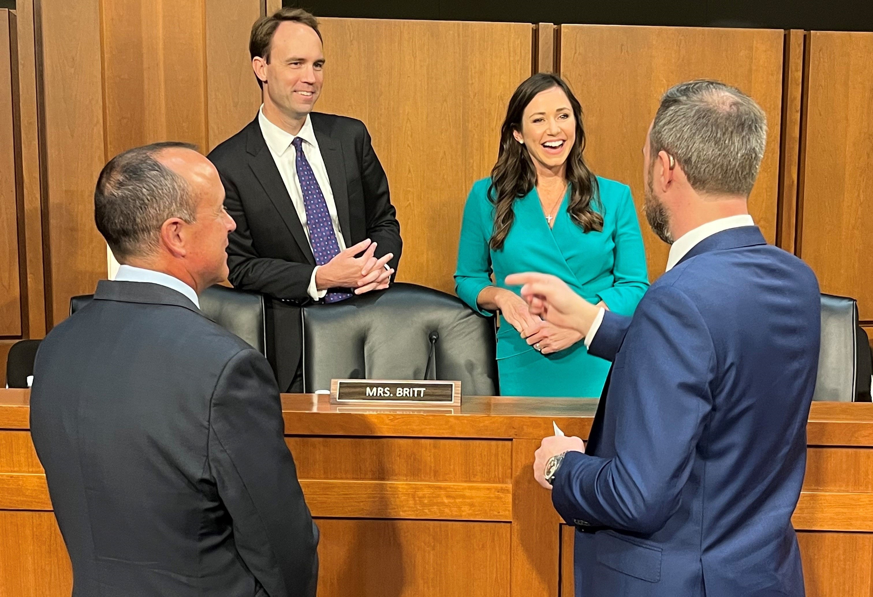 President David J. Glawe and VP Kyle McCollum speaking with two representatives of congress