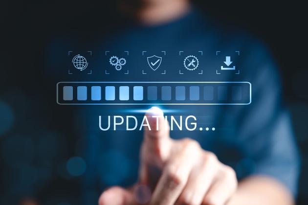 Person pointing at hovering updating bar