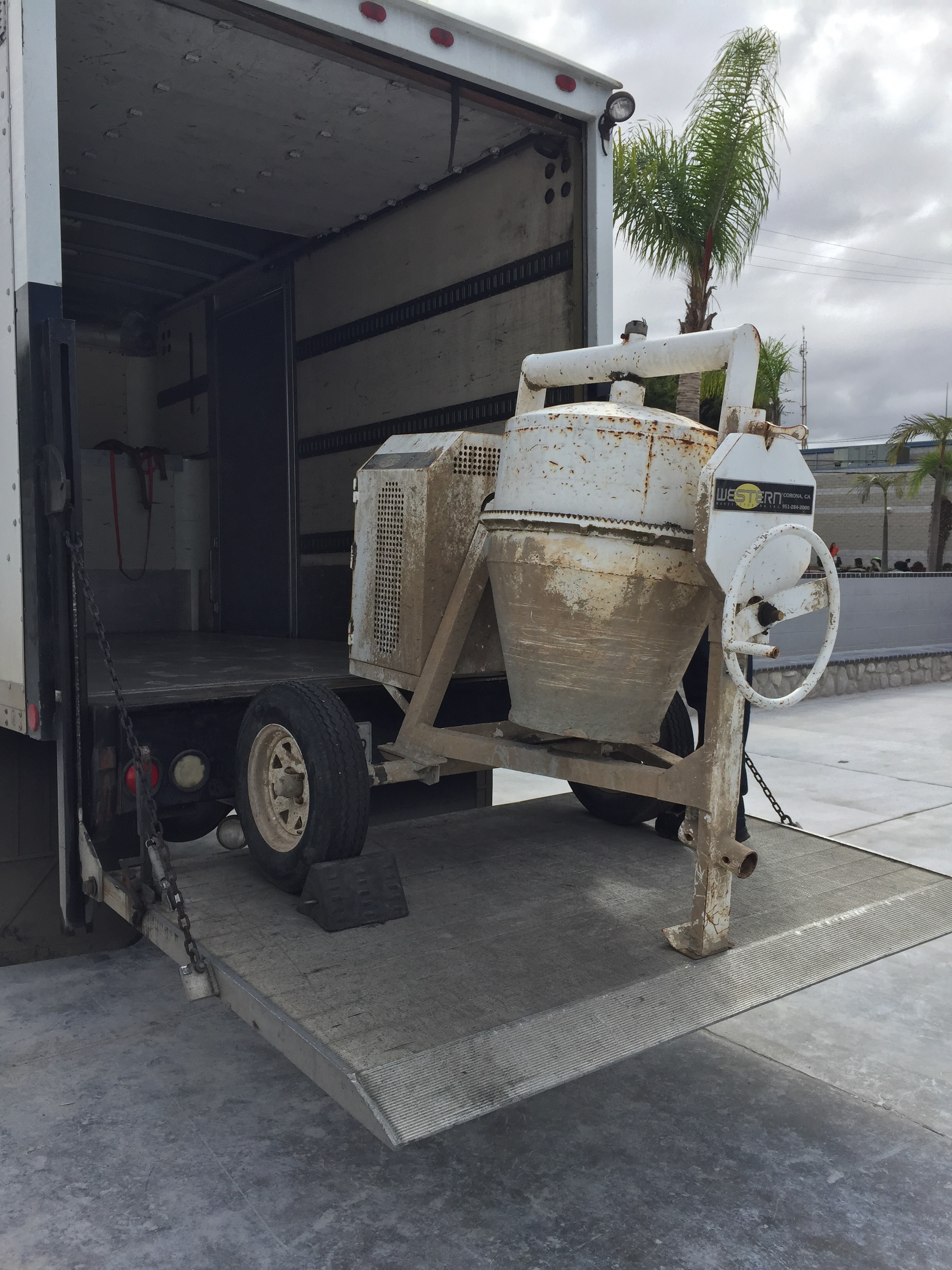 Unloading cement mixer from truck